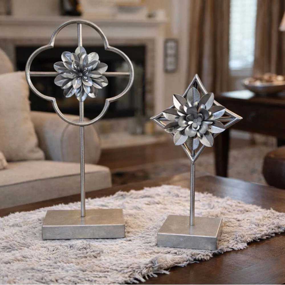 Home decor accents  two silver flowers on pedestal stand